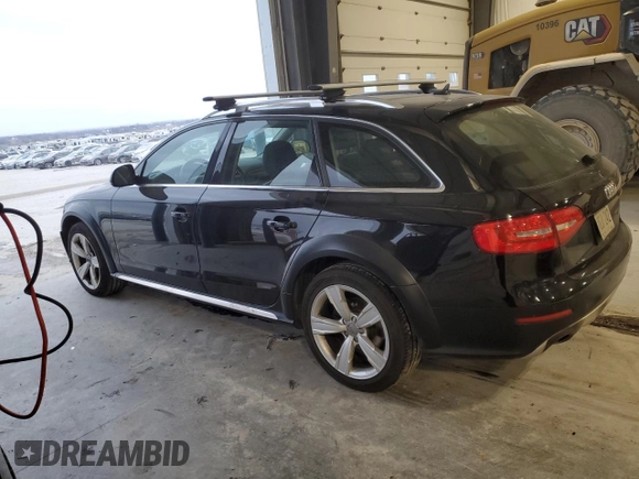 2014 Audi allroad Premium Plus with VIN WA1UFAFL4EA040939, listed as a Copart auction lot 87587215 with 142,593 mi miles and Salvage Title. Bid and sale history available at carsss.com. Image 2.