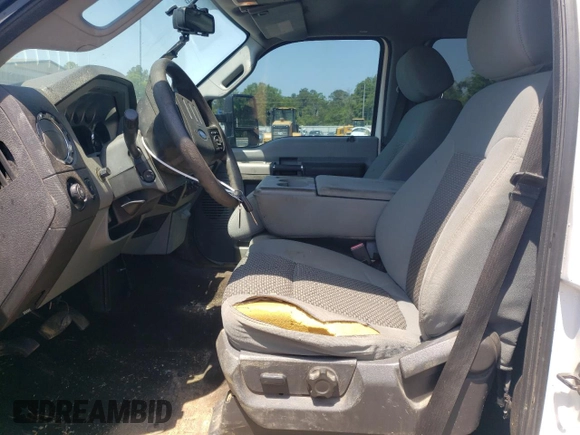 2014 Ford F-350 XLT with VIN 1FT8W3BT9EEA72092, listed as a Copart auction lot 53665775 with 298,659 mi miles and Salvage Title. Bid and sale history available at DreamBid. Image 7.