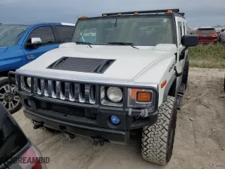 2005 Hummer H2 SUV with VIN 5GRGN23UX5H116341, listed as a Copart auction lot 76877704 with 145,778 mi miles and Salvage Title. Bid and sale history available at carsss.com. Image 5.