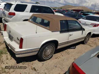 1991 Cadillac Eldorado z VIN 1G6EL13B2MU602660, wystawiony jako Copart lot #67365674 z przebiegiem 108 880 mil mil oraz Szkody całkowita. Historia ofert i sprzedaży dostępna na DreamBid. Obrazek 3.