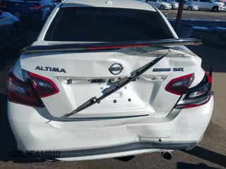 2018 Nissan Altima SR with VIN 1N4AL3AP2JC163232, listed as a IAAI auction lot 41818746 with 73,707 mi miles and . Bid and sale history available at carsss.com. Image 6.