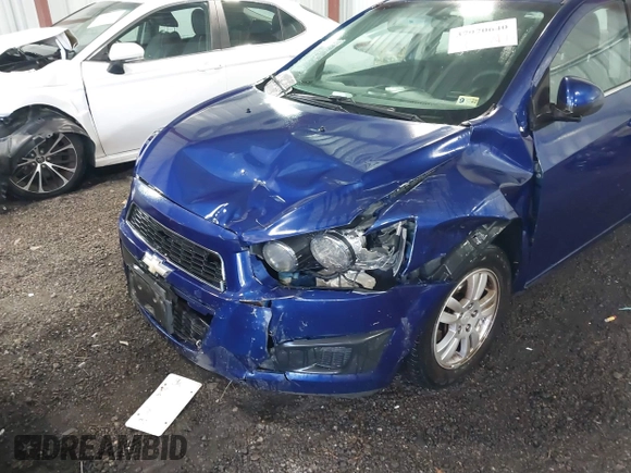2014 Chevrolet Sonic LT with VIN 1G1JC5SG4E4136790, listed as a IAAI auction lot 37970640 with 180,252 mi miles and . Bid and sale history available at DreamBid. Image 6.