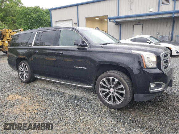 2017 GMC Yukon XL SLT with VIN 1GKS1GKC5HR332484, listed as a Copart auction lot 51957095 with 188,204 mi miles and Salvage Title. Bid and sale history available at DreamBid. Image 4.