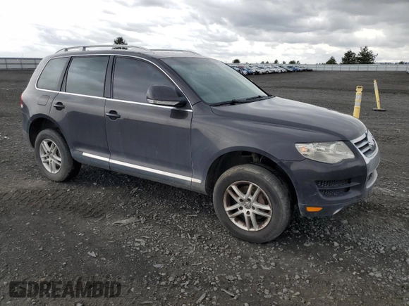 2008 Volkswagen Touareg V6 z VIN WVGBE77LX8D000610, wystawiony jako Copart lot #58434065 z przebiegiem 208 718 mil mil oraz Czysty tytuł • Clean title. Historia ofert i sprzedaży dostępna na DreamBid. Obrazek 4.