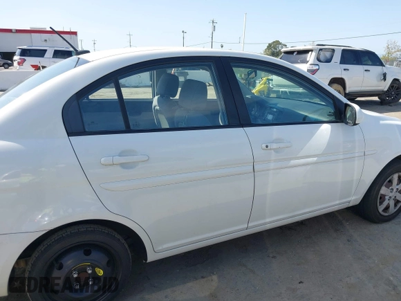 2010 Hyundai Accent GLS with VIN KMHCN4AC7AU473527, listed as a IAAI auction lot 41965592 with 104,506 mi miles. Bid and sale history available at carsss.com. Image 13.