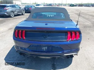2020 Ford Mustang EcoBoost with VIN 1FATP8UH2L5127689, listed as a IAAI auction lot 42219307 with 21,399 mi miles and . Bid and sale history available at DreamBid. Image 16.
