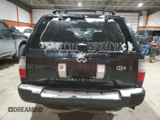 2000 Infiniti QX4 z VIN JNRAR07Y6YW080306, wystawiony jako Copart lot #85022064 z przebiegiem 278 383 mil mil oraz Tytuł czysty. Historia ofert i sprzedaży dostępna na DreamBid. Obrazek 6.