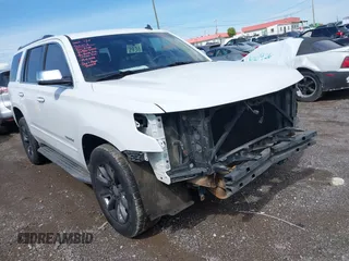2015 Chevrolet Tahoe LTZ with VIN 1GNSCCKC9FR148068, listed as a IAAI auction lot 42101740 with 142,712 mi miles and . Bid and sale history available at DreamBid. Image 1.