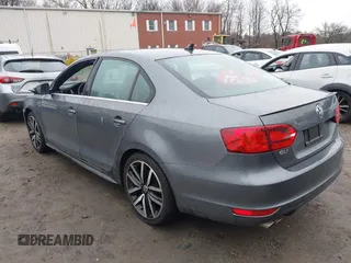 2012 Volkswagen Jetta GLI Autobahn with VIN 3VW5A7AJ5CM410777, listed as a IAAI auction lot 41729287 with 116,427 mi miles and . Bid and sale history available at DreamBid. Image 3.
