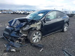2022 Tesla Model Y Long Range z VIN 7SAYGDEE4NF447985, wystawiony jako IAAI lot #41811782 z przebiegiem 81 973 mil mil oraz . Historia ofert i sprzedaży dostępna na DreamBid. Obrazek 18.