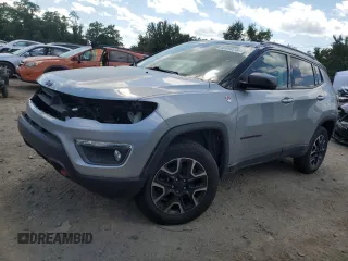2021 Jeep Compass Trailhawk with VIN 3C4NJDDB1MT529228, listed as a Copart auction lot 60490744 with 64,949 mi miles and Salvage title. Bid and sale history available at DreamBid. Image 1.