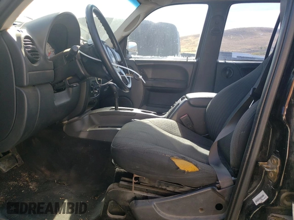 2003 Jeep Liberty Sport with VIN 1J4GK48K63W581392, listed as a Copart auction lot 75529424 with 182,982 mi miles and Salvage Title. Bid and sale history available at DreamBid. Image 7.
