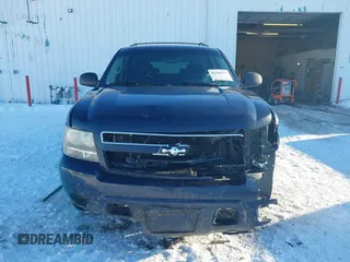 2008 Chevrolet Suburban Commercial with VIN 1GNFK16318J207263, listed as a IAAI auction lot 41246619 with 247,454 mi miles. Bid and sale history available at carsss.com. Image 12.