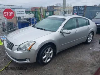 2004 Nissan Maxima SL with VIN 1N4BA41E14C802963, listed as a IAAI auction lot 41852156 with 112,855 mi miles. Bid and sale history available at carsss.com. Image 2.