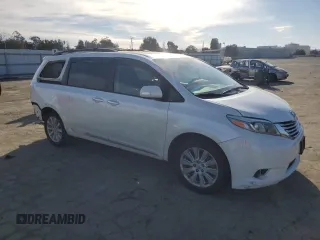 2015 Toyota Sienna Limited with VIN 5TDDK3DC2FS099332, listed as a Copart auction lot 47571435 with 107,449 mi miles and Salvage Title. Bid and sale history available at DreamBid. Image 4.