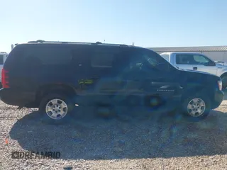2014 Chevrolet Suburban LT with VIN 1GNSCJE00ER198703, listed as a IAAI auction lot 41952805 with 228,579 mi miles and . Bid and sale history available at DreamBid. Image 13.