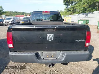 2014 Ram 1500 Tradesman z VIN 3C6JR7DG4EG324833, wystawiony jako IAAI lot #42876061 z przebiegiem 125 285 mil mil oraz . Historia ofert i sprzedaży dostępna na DreamBid. Obrazek 16.