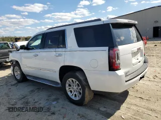 2015 GMC Yukon SLT with VIN 1GKS2BKC4FR143581, listed as a Copart auction lot 50591645 with 0 mi miles and Salvage Title. Bid and sale history available at carsss.com. Image 2.