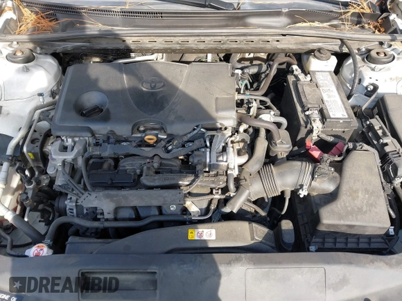 2020 Toyota Camry LE with VIN 4T1C11AKXLU986310, listed as a IAAI auction lot 40977100 with 108,208 mi miles and . Bid and sale history available at DreamBid. Image 10.