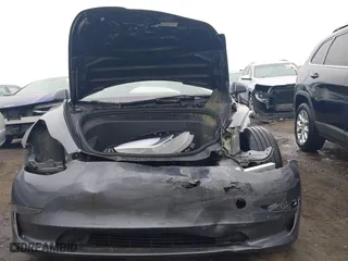 2023 Tesla Model 3 with VIN 5YJ3E1EA7PF642913, listed as a IAAI auction lot 41898249 with 26,394 mi miles. Bid and sale history available at carsss.com. Image 13.