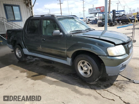 2002 Ford Explorer Sport Trac Value with VIN 1FMZU67E72UC81009, listed as a Copart auction lot 54929835 with 130,862 mi miles and Salvage title. Bid and sale history available at DreamBid. Image 4.