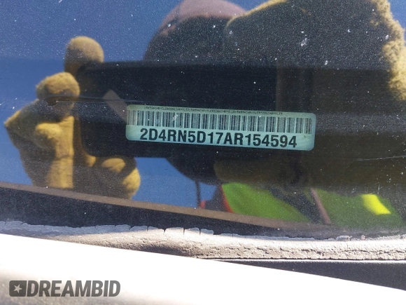 2010 Dodge Grand Caravan SXT with VIN 2D4RN5D17AR154594, listed as a IAAI auction lot 41751767 with Not Provided miles and . Bid and sale history available at DreamBid. Image 9.