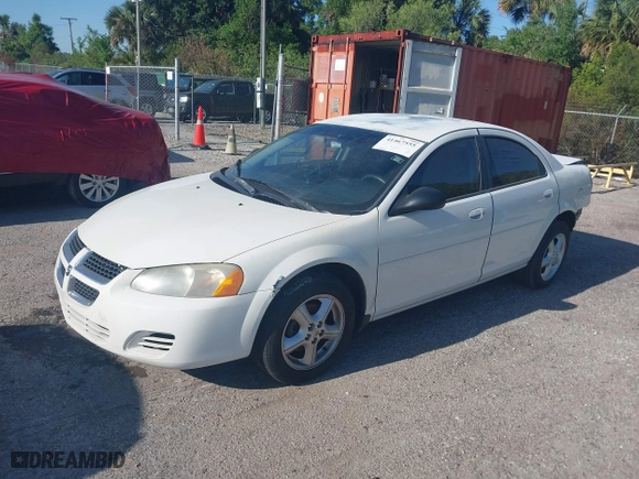 2005 Dodge Stratus Sdn SXT with VIN 1B3EL46X95N568803, listed as a IAAI auction lot 41467555 with 122,610 mi miles. Bid and sale history available at carsss.com. Image 18.
