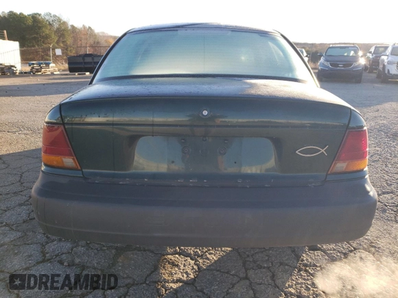 1997 Saturn SL z VIN 1G8ZH5285VZ122690, wystawiony jako Copart lot #81655244 z przebiegiem 159 048 mil mil oraz Szkoda całkowita • Salvage title. Historia ofert i sprzedaży dostępna na DreamBid. Obrazek 6.