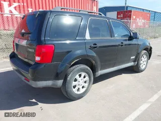 2008 Mazda Tribute Grand Touring with VIN 4F2CZ02Z28KM14136, listed as a IAAI auction lot 41878738 with 155,465 mi miles. Bid and sale history available at carsss.com. Image 4.