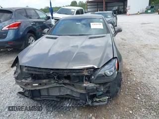 2015 Mercedes-Benz SLK 250 z VIN WDDPK4HA5FF110938, wystawiony jako IAAI lot #42098160 z przebiegiem 46 779 mil mil oraz . Historia ofert i sprzedaży dostępna na DreamBid. Obrazek 13.