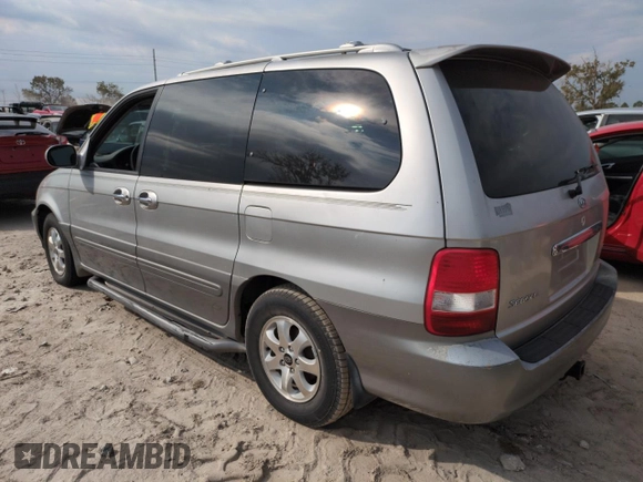 2004 Kia Sedona LX with VIN KNDUP131046534898, listed as a Copart auction lot 75387904 with 0 mi miles and Non Repairable. Bid and sale history available at carsss.com. Image 2.