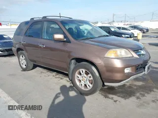 2004 Acura MDX Touring Pkg w/Navigation with VIN 2HNYD18854H511500, listed as a IAAI auction lot 41581417 with 223,757 mi miles. Bid and sale history available at carsss.com. Image 1.