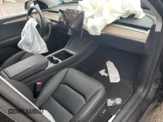 2024 Tesla Model Y Long Range с VIN 7SAYGDEE7RF180945, выставлен на аукционе Copart как лот 62059735 с пробегом Не указан миль и Списание • Salvage title. История ставок и продаж доступна на DreamBid. Изображение 8.