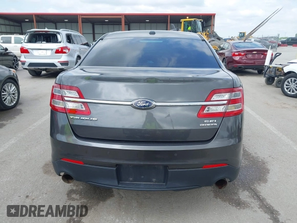 2015 Ford Taurus SEL with VIN 1FAHP2E83FG175051, listed as a IAAI auction lot 42357517 with 200,033 mi miles and . Bid and sale history available at DreamBid. Image 16.