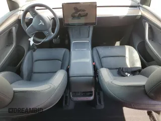 2023 Tesla Model Y Long Range with VIN 7SAYGDEEXPF770800, listed as a Copart auction lot 48324515 with 25,205 mi miles and Salvage Title. Bid and sale history available at DreamBid. Image 8.