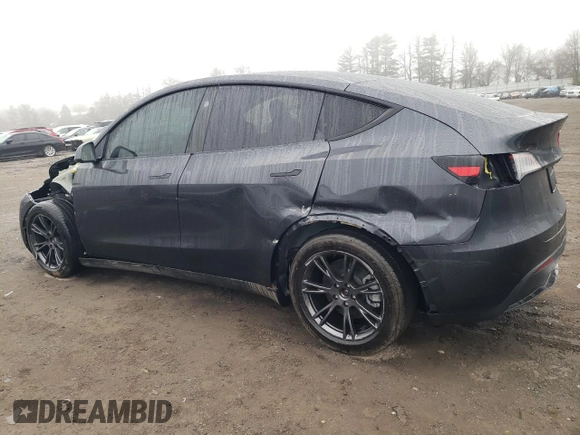 2025 Tesla Model Y Long Range z VIN 7SAYGDED9SF269767, wystawiony jako Copart lot #51588985 z przebiegiem 1 943 mil mil oraz Szkoda całkowita • Salvage title. Historia ofert i sprzedaży dostępna na DreamBid. Obrazek 2.