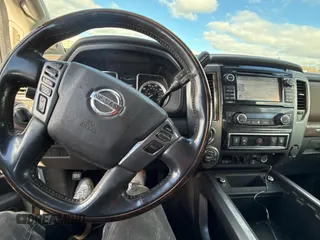 2016 Nissan Titan XD PRO-4X with VIN 1N6BA1F40GN515810, listed as a Copart auction lot 87436204 with 210,650 mi miles and Clean Title. Bid and sale history available at carsss.com. Image 9.