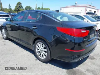 2015 Kia Optima LX with VIN KNAGM4A7XF5615069, listed as a IAAI auction lot 42234624 with 174,078 mi miles and . Bid and sale history available at DreamBid. Image 3.