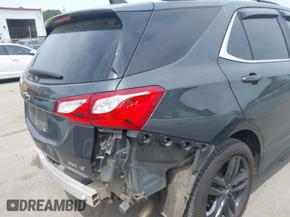 2021 Chevrolet Equinox LT with VIN 3GNAXUEVXML341465, listed as a IAAI auction lot 42027654 with 126,932 mi miles and . Bid and sale history available at DreamBid. Image 18.