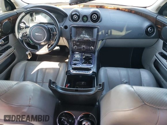 2012 Jaguar XJ with VIN SAJWA1CB7CLV33879, listed as a Copart auction lot 88708995 with Not provided miles and Salvage title. Bid and sale history available at DreamBid. Image 8.