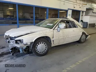 2001 Cadillac Eldorado Touring ETC z VIN 1G6ET12981B106400, wystawiony jako Copart lot #42353495 z przebiegiem Nie podano mil oraz Szkody całkowita. Historia ofert i sprzedaży dostępna na DreamBid. Obrazek 1.