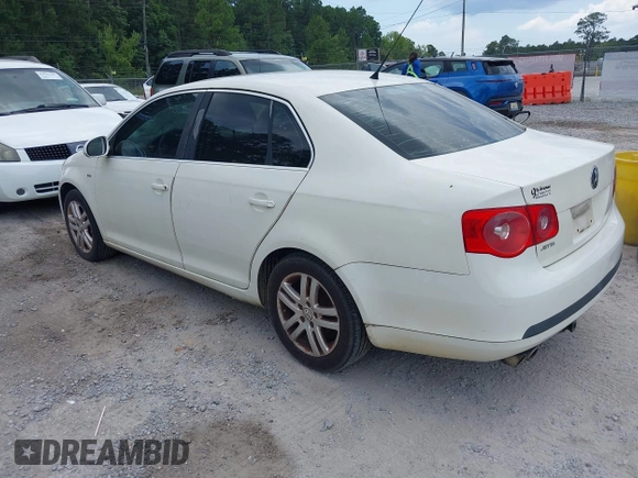 2007 Volkswagen Jetta Wolfsburg Edition z VIN 3VWEF71K47M192184, wystawiony jako IAAI lot #42573483 z przebiegiem 207 809 mil mil oraz . Historia ofert i sprzedaży dostępna na DreamBid. Obrazek 3.