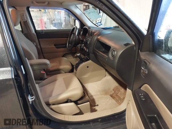 2014 Jeep Patriot Latitude with VIN 1C4NJPFA0ED633657, listed as a IAAI auction lot 41447982 with 104,664 mi miles and . Bid and sale history available at carsss.com. Image 5.