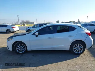 2014 Mazda 3 i Grand Touring with VIN JM1BM1M7XE1102093, listed as a IAAI auction lot 41344433 with 148,395 mi miles and . Bid and sale history available at DreamBid. Image 14.