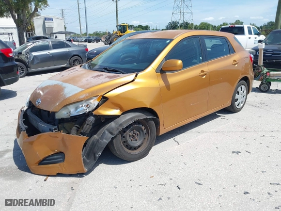 2009 Toyota Matrix S with VIN 2T1LE40E49C001740, listed as a IAAI auction lot 42088899 with 173,939 mi miles. Bid and sale history available at carsss.com. Image 2.