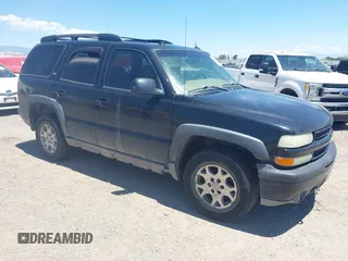 2005 Chevrolet Tahoe LT z VIN 1GNEK13T35R116833, wystawiony jako IAAI lot #42508302 z przebiegiem 254 759 mil mil oraz . Historia ofert i sprzedaży dostępna na DreamBid. Obrazek 1.