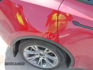 2023 Tesla Model Y Long Range z VIN 7SAYGAEE7PF691499, wystawiony jako IAAI lot #42038850 z przebiegiem 26 439 mil mil oraz . Historia ofert i sprzedaży dostępna na DreamBid. Obrazek 22.