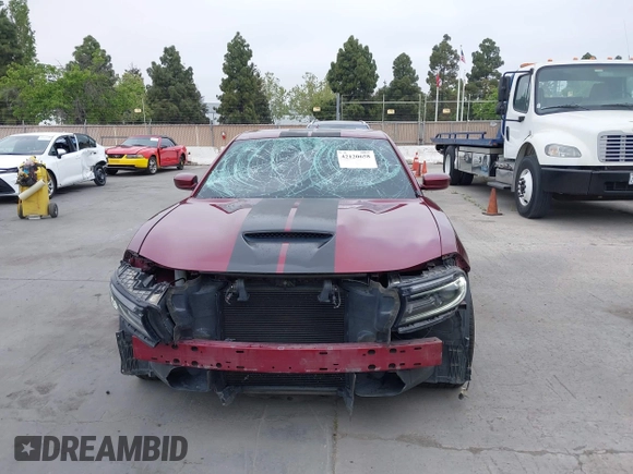 2019 Dodge Charger R/T with VIN 2C3CDXCT2KH749207, listed as a IAAI auction lot 42120658 with 52,330 mi miles and . Bid and sale history available at carsss.com. Image 6.