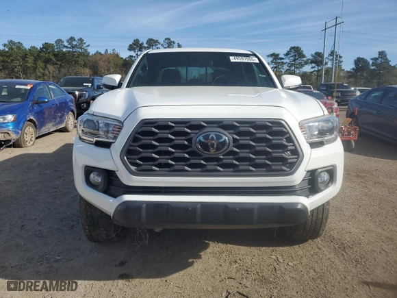2021 Toyota Tacoma 4WD SR with VIN 5TFCZ5AN8MX260072, listed as a Copart auction lot 49597065 with 84,673 mi miles and Salvage Title. Bid and sale history available at carsss.com. Image 5.