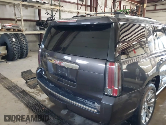 2016 GMC Yukon Denali with VIN 1GKS2CKJ8GR215954, listed as a IAAI auction lot 41362739 with 143,982 mi miles. Bid and sale history available at carsss.com. Image 15.